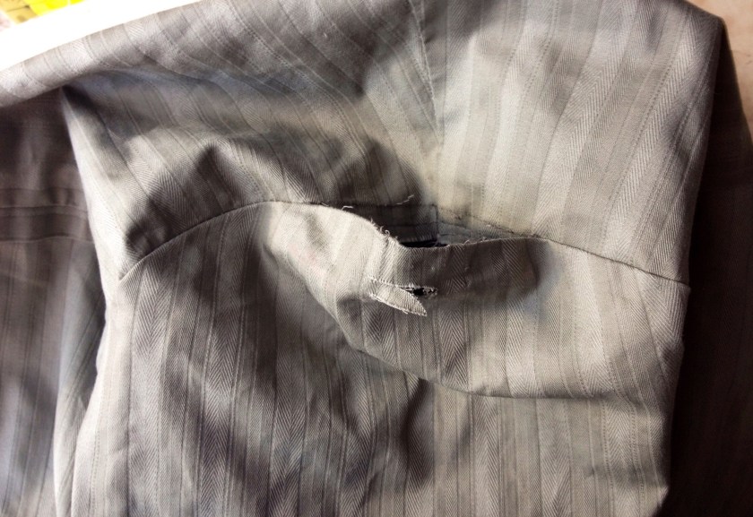 First of all unpick the seam above. 